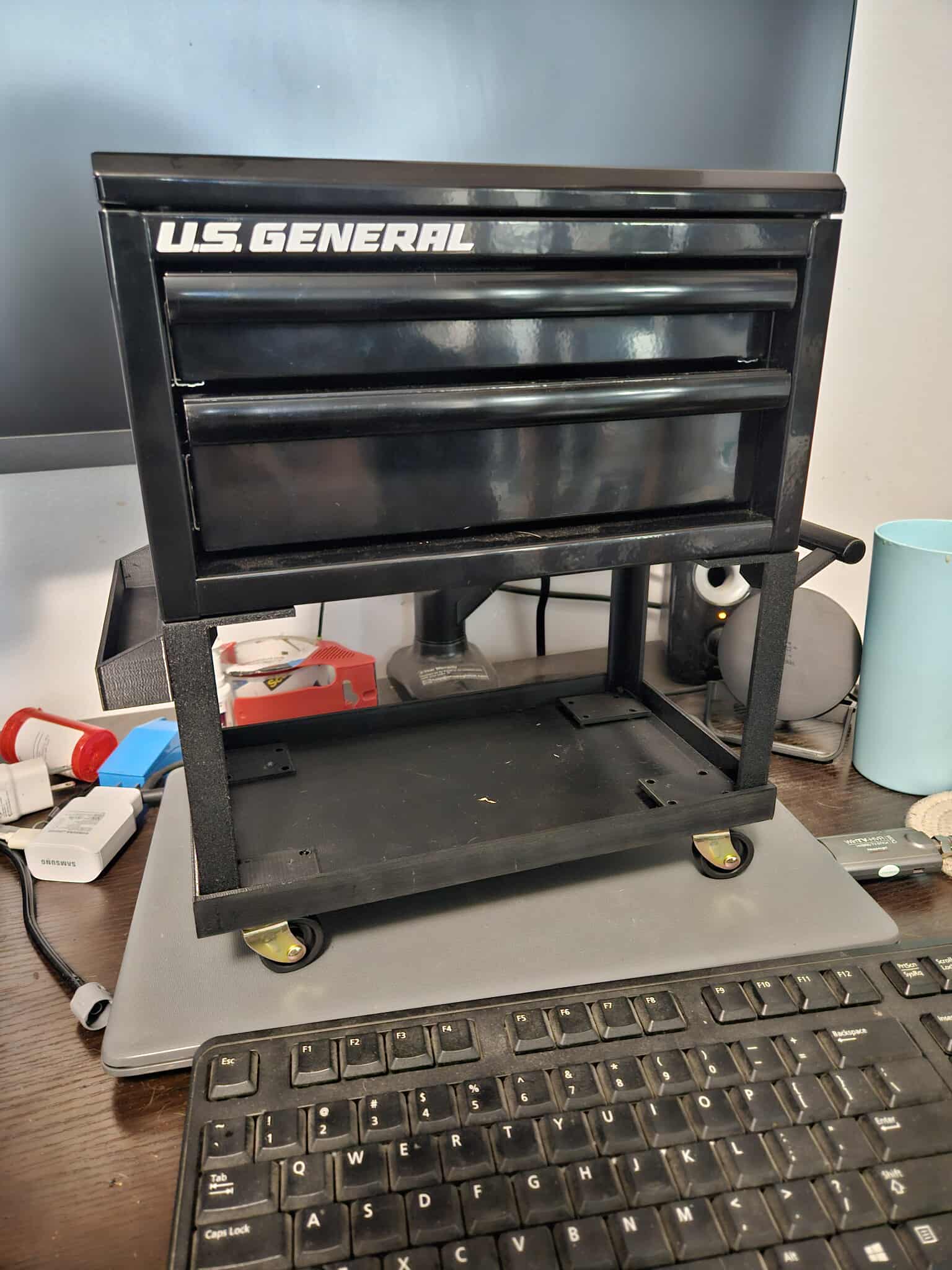 Printed cart frame components assembled with hardware to fit a mini Harbor Freight toolbox