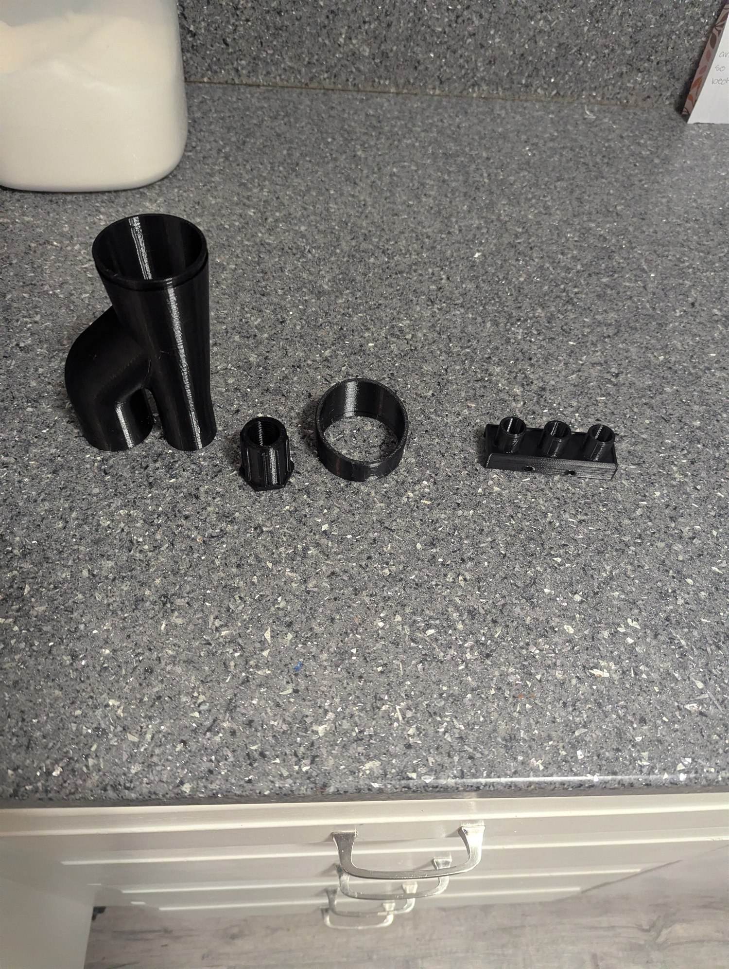 Black 3D-printed Tornador vacuum connection and pressure-washer stubby-handle nozzle attachment made for a customer