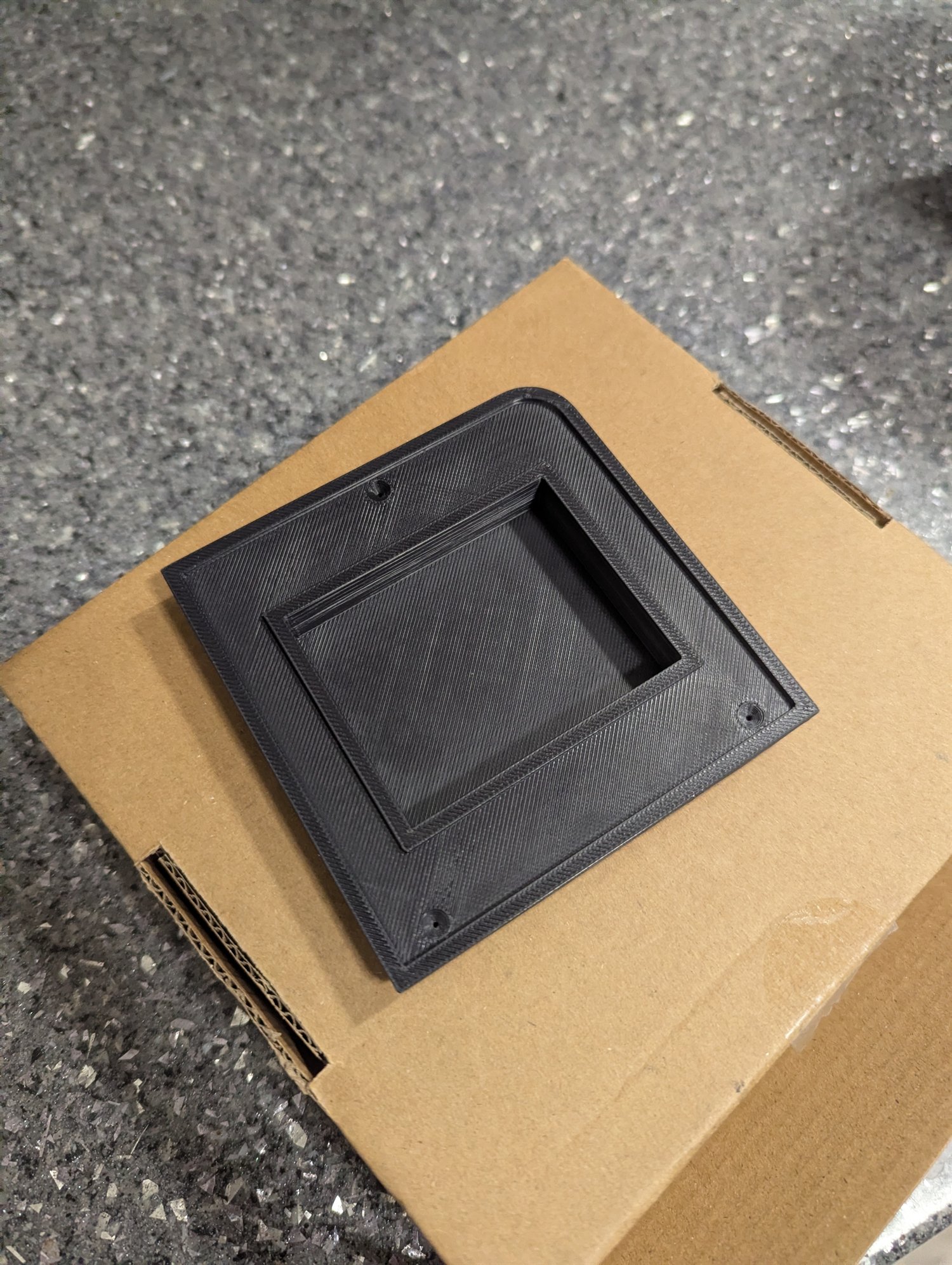 Black 3D-printed truck vent LCD mount housing before the controller was installed